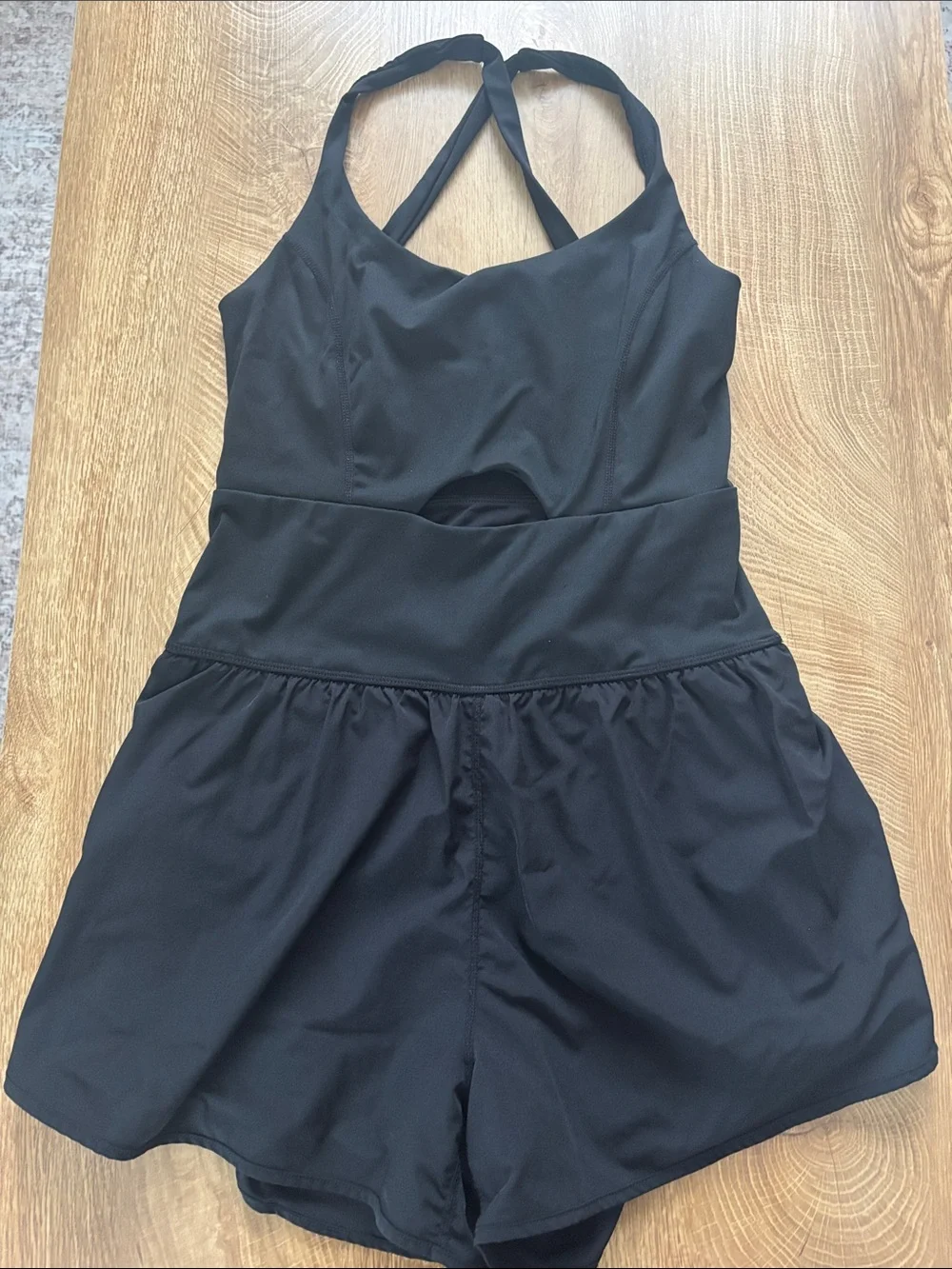 Black sporty romper with Built-In Shorts and cross shoulder straps